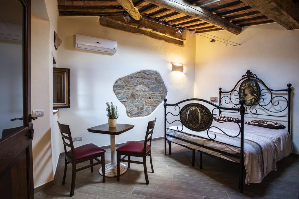 Antico Borgo Seggiano Acomodação com café da manhã Quarto foto